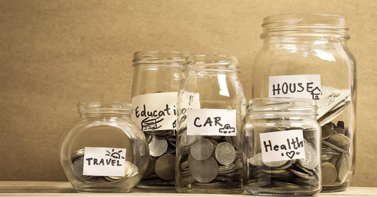 Coins in glass savings jars