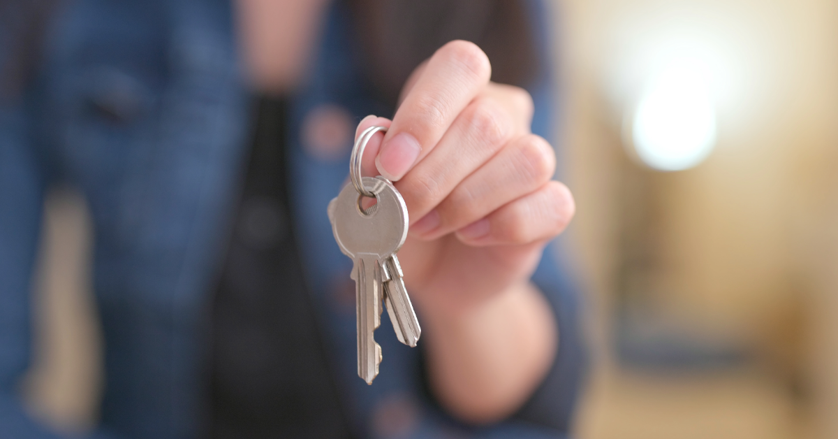 Person holding house keys